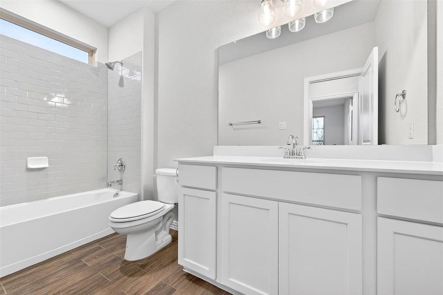 Furnished interior view inside a new home in Lily Creek at Sutton Fields, Aubrey (Image 9).