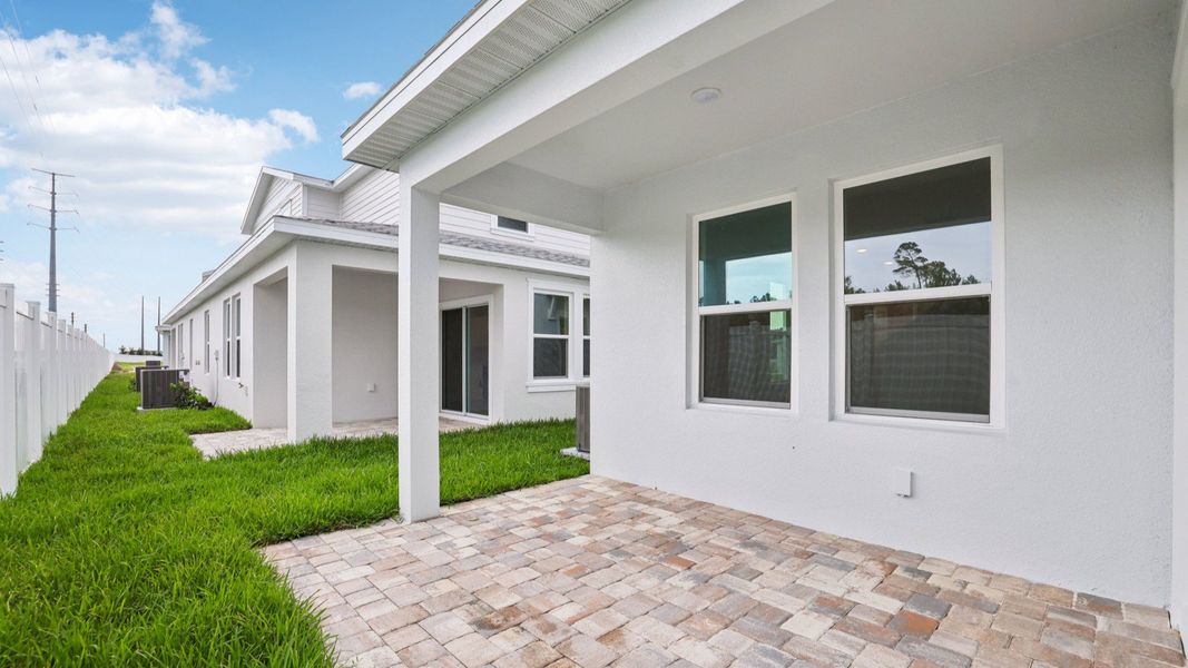 Covered Lenei of the Coronado - End at Cyrene at Harmony located in St Cloud FL by DRB Homes Covered Lenei of the Coronado - End at Cyrene at Harmony located in St Cloud FL by DRB Homes