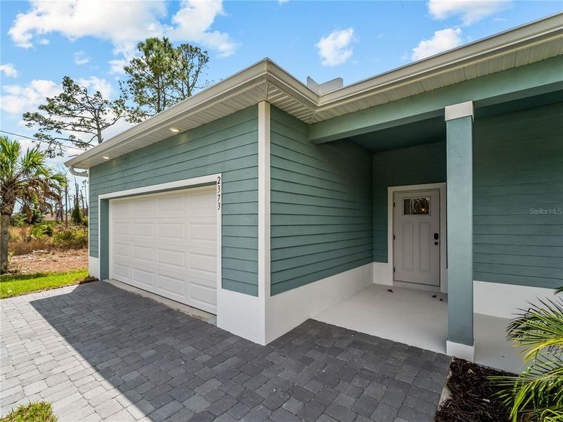 Exterior details and patio area of a home in , North Port (Image 26).