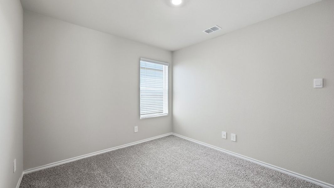 Representative unfurnished interior of a home built from the Caprock by D.R. Horton in Hickory Grove, Krum (Image 38).