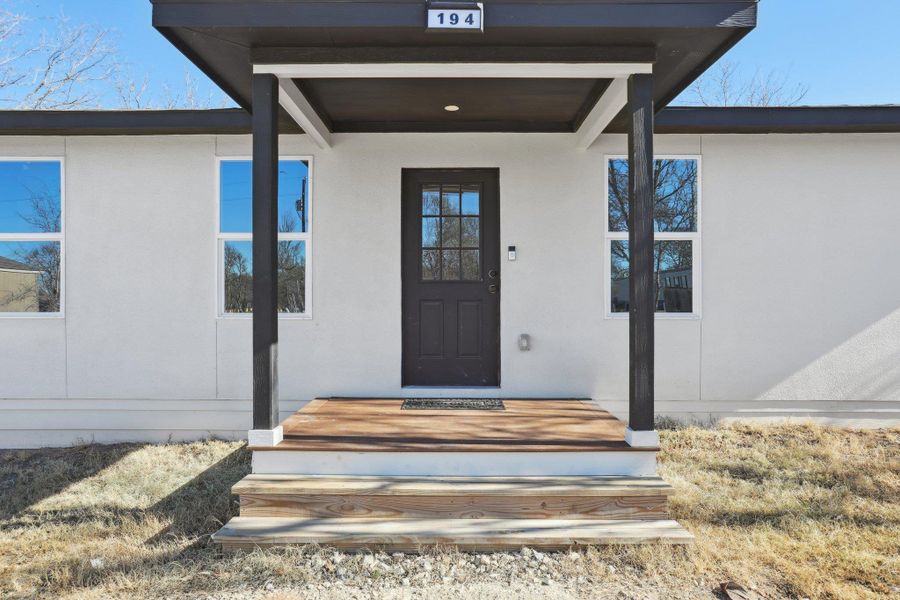 Exterior details and patio area of a home in , Dale (Image 21).