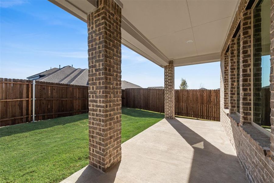 Exterior details and patio area of a home in Villages of Hurricane Creek, Anna (Image 3). Exterior details and patio area of a home in Villages of Hurricane Creek, Anna (Image 3).