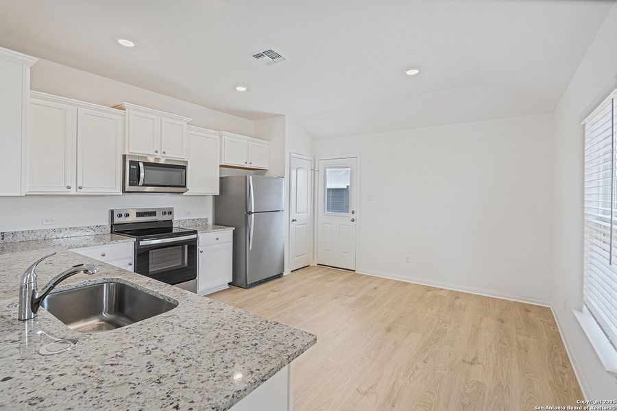 Furnished interior view inside a new home in Preserve at Medina, Von Ormy (Image 6).