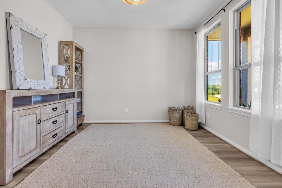 This versatile room is shown in its original, unedited condition, giving you a clear view of the space as it currently appears.