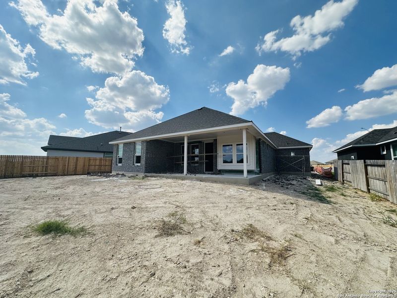 Exterior details and patio area of a home in Village at Three Oaks, Seguin (Image 2). Exterior details and patio area of a home in Village at Three Oaks, Seguin (Image 2).
