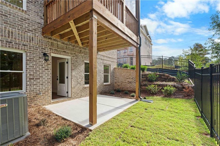 Exterior details and patio area of a home in Ward's Crossing Townhomes, Johns Creek (Image 31). Exterior details and patio area of a home in Ward's Crossing Townhomes, Johns Creek (Image 31).