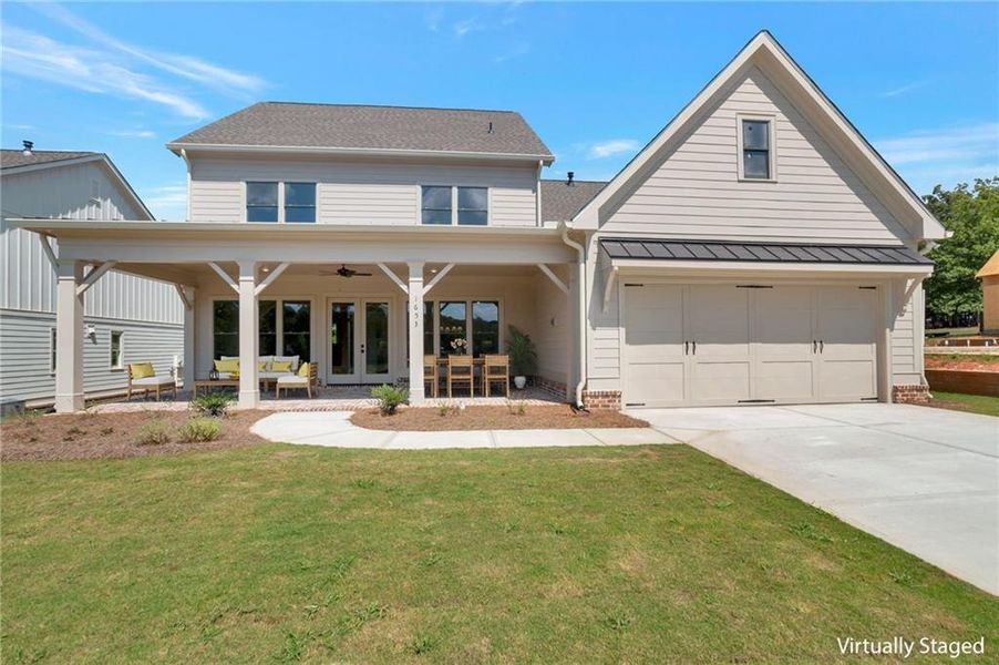 Front exterior of a new home in , Statham, GA, highlighting curb appeal (Image 23).