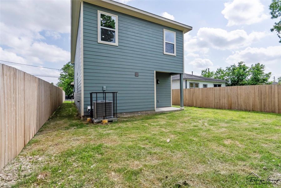 Back of house. Cage for AC has been installed and is removable. Back of house. Cage for AC has been installed and is removable.