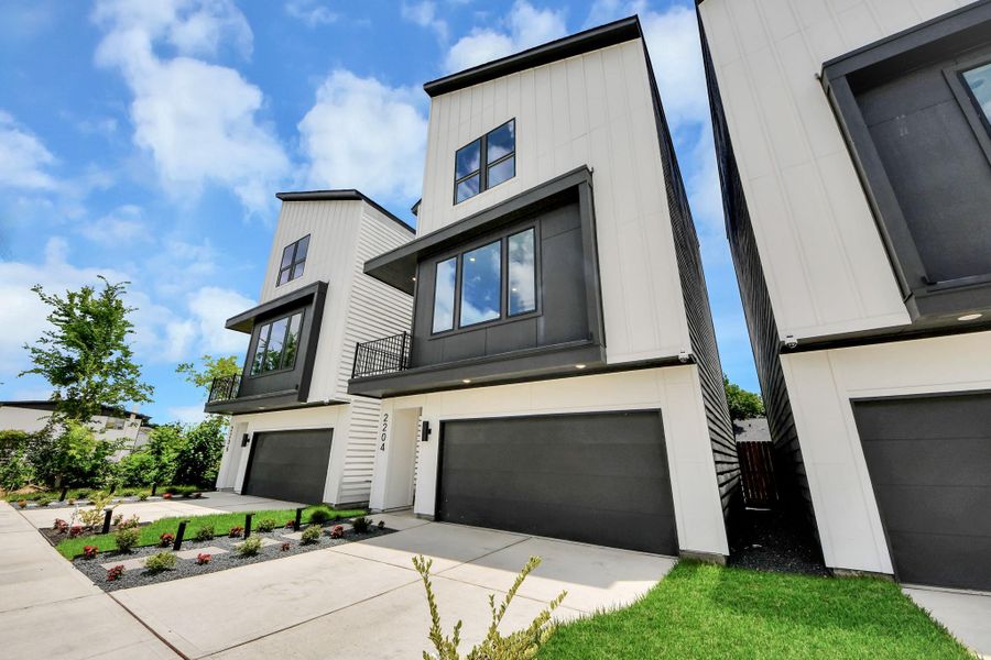 Front exterior of a new home in , Houston, TX, highlighting curb appeal (Image 26). Front exterior of a new home in , Houston, TX, highlighting curb appeal (Image 26).