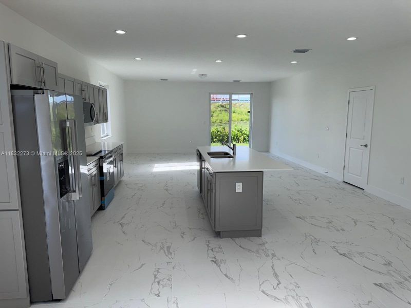 Furnished interior view inside a new home in , Homestead (Image 13). Furnished interior view inside a new home in , Homestead (Image 13).