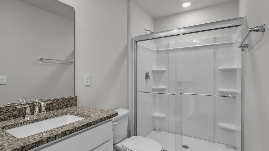 Furnished interior view inside a new home in Grayson Park Duets, Leland (Image 11).