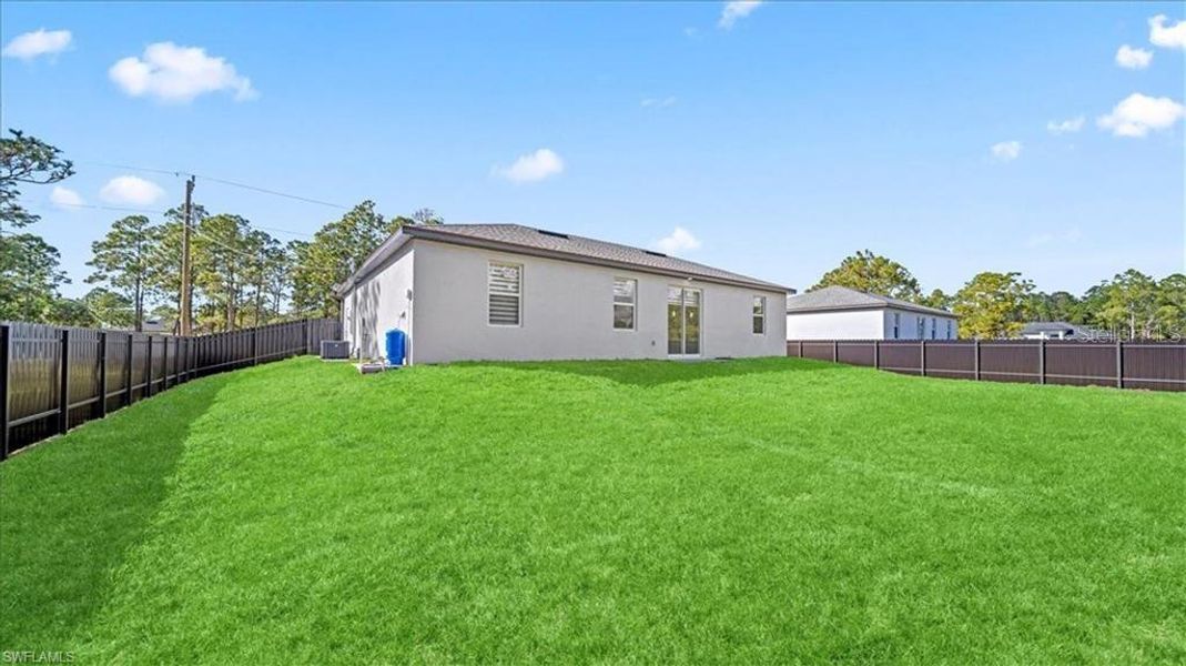 Exterior details and patio area of a home in , Lehigh Acres (Image 32).