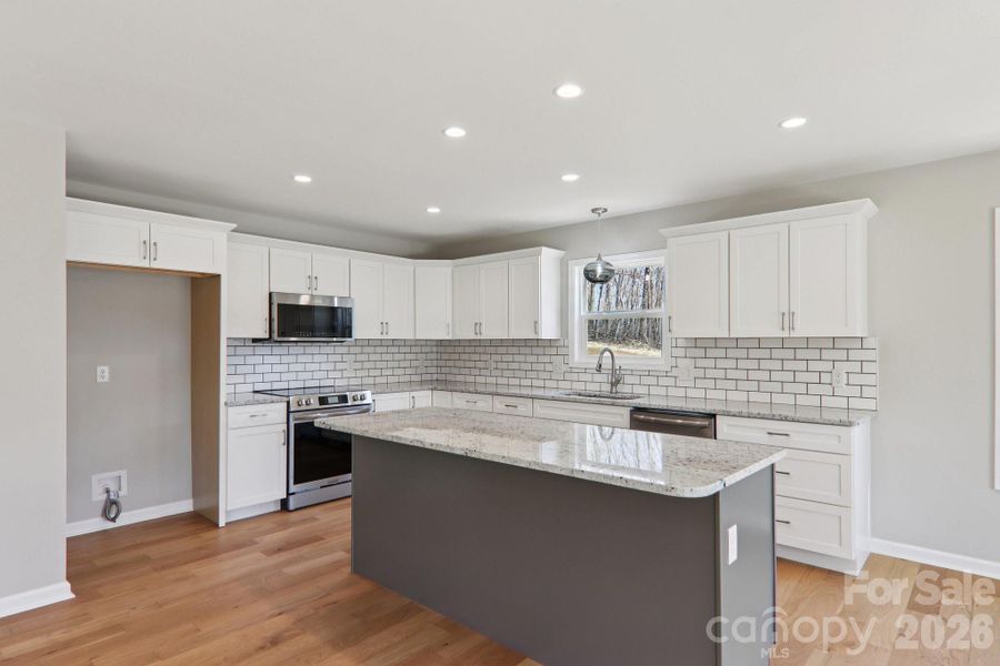 Furnished interior view inside a new home in , Candler (Image 13). Furnished interior view inside a new home in , Candler (Image 13).