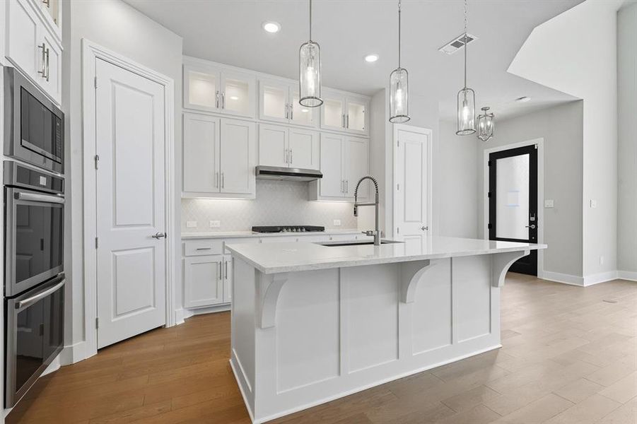 Furnished interior view inside a new home in Walsh: Townhomes - The Patios, Aledo (Image 12). Furnished interior view inside a new home in Walsh: Townhomes - The Patios, Aledo (Image 12).