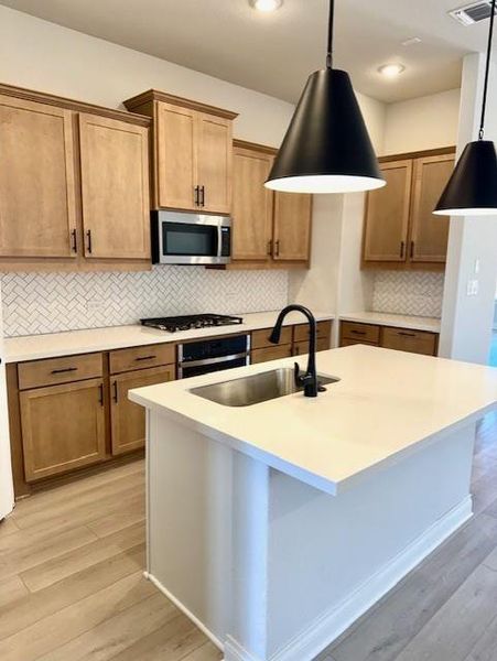 Furnished interior view inside a new home in Heritage, Dripping Springs (Image 7).