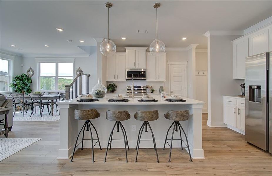 Furnished interior view inside a new home in The Towns at Auburn Station East, Auburn (Image 4).