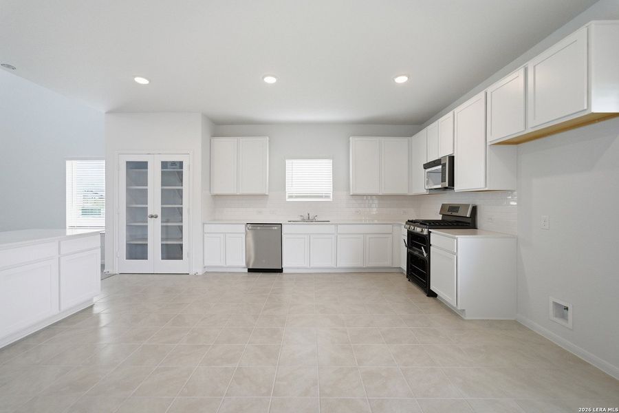 Furnished interior view inside a new home in Hennersby Hollow, San Antonio (Image 14).