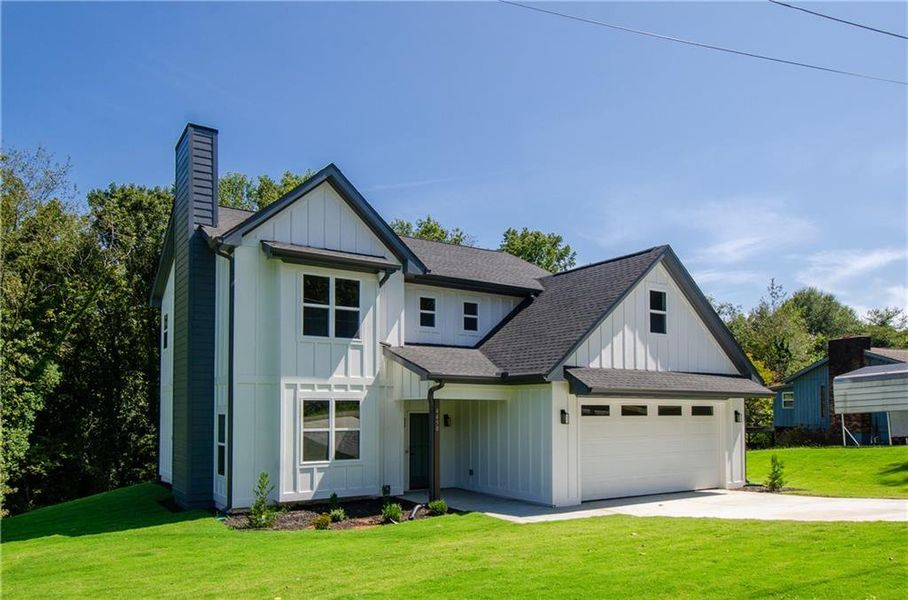Front exterior of a new home in , Gainesville, GA, highlighting curb appeal (Image 2).