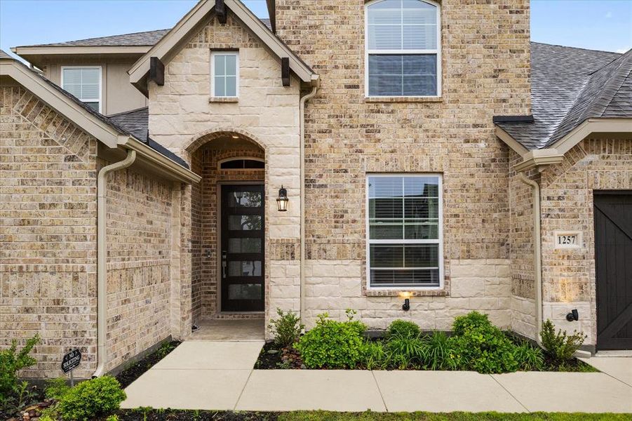 Exterior details and patio area of a home in Gideon Grove, Rockwall (Image 22).