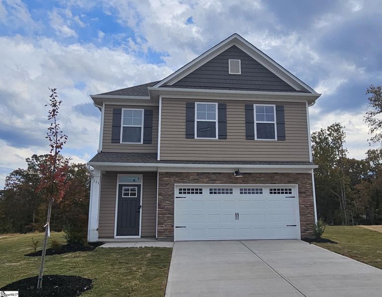 Front exterior of a new home in Sedona, Greenville, SC, highlighting curb appeal (Image 1).