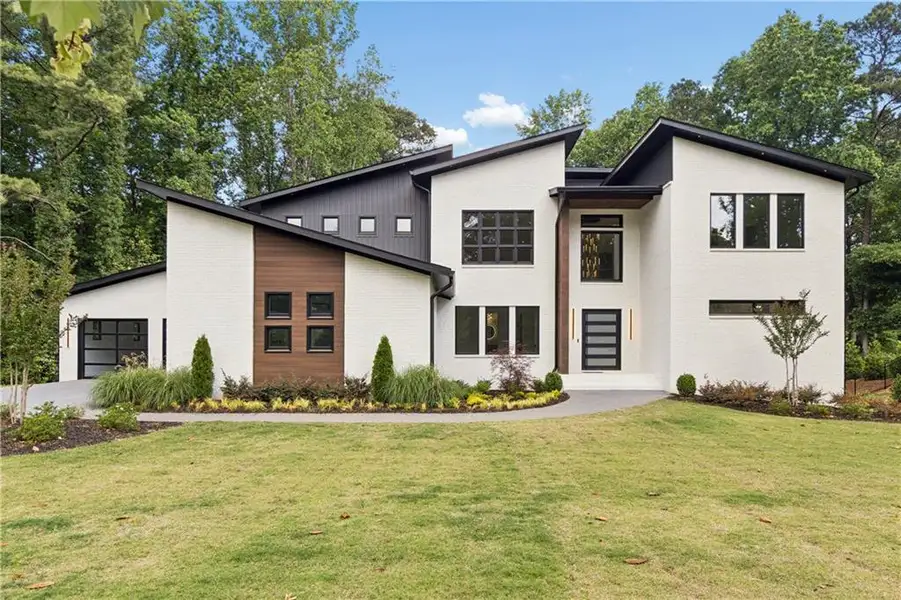 Front exterior of a new home in , Sandy Springs, GA, highlighting curb appeal (Image 28).