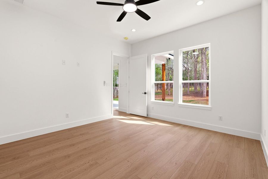 Master Bedroom micro beveled lvp  floors and ceiling fan