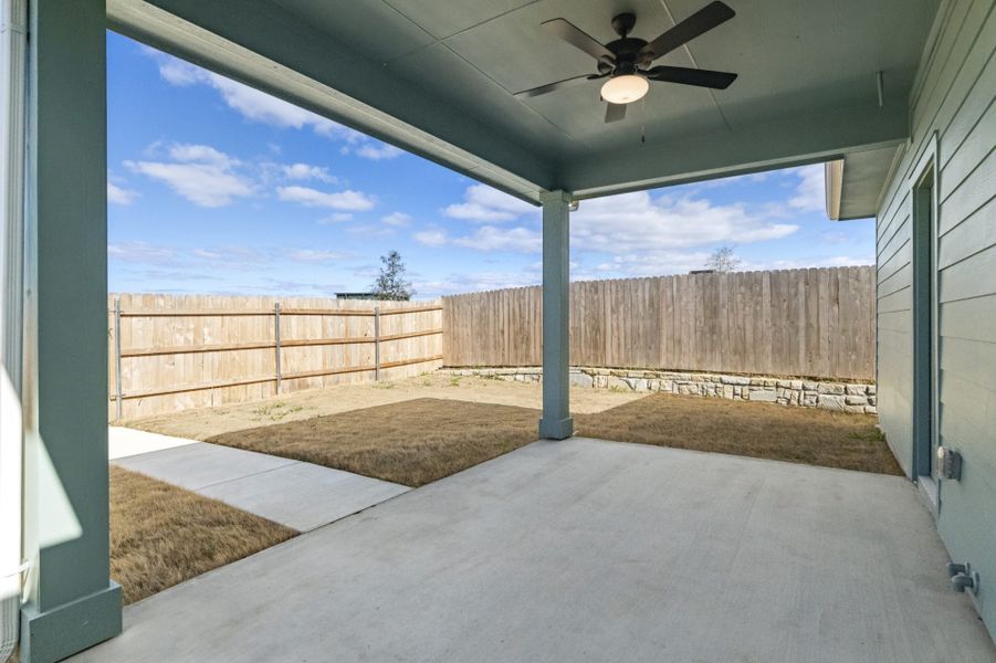 Exterior details and patio area of a home in Whisper Valley, Manor (Image 3).