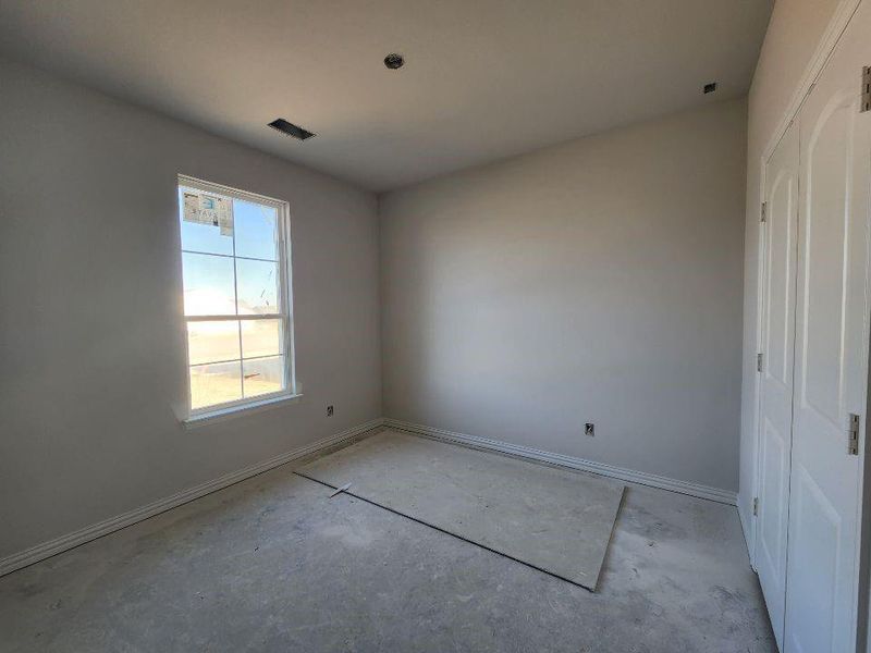 Spare room with baseboards