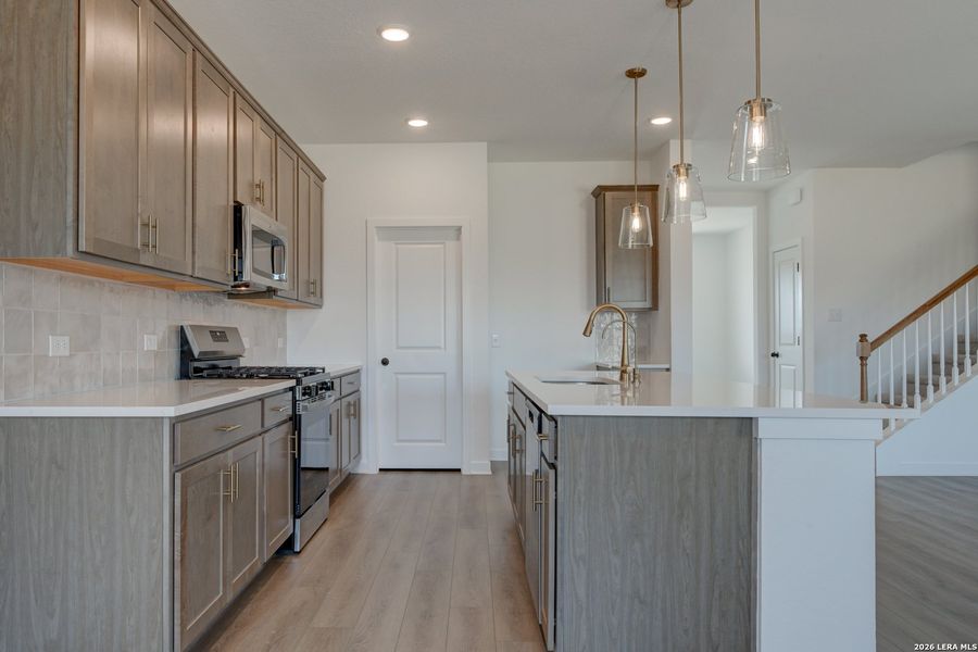 Furnished interior view inside a new home in Nopal Valley, San Antonio (Image 9).