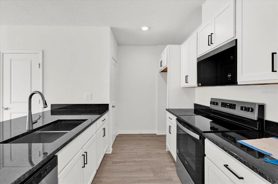 Furnished interior view inside a new home in Reserve at Forest Lake Townhomes, Lake Wales (Image 7).
