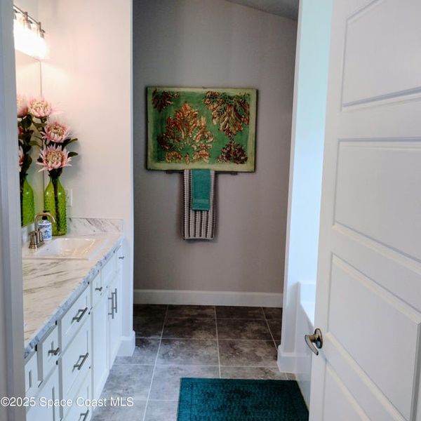 Furnished interior view inside a new home in Courtyard at Waterstone, Palm Bay (Image 11). Furnished interior view inside a new home in Courtyard at Waterstone, Palm Bay (Image 11).