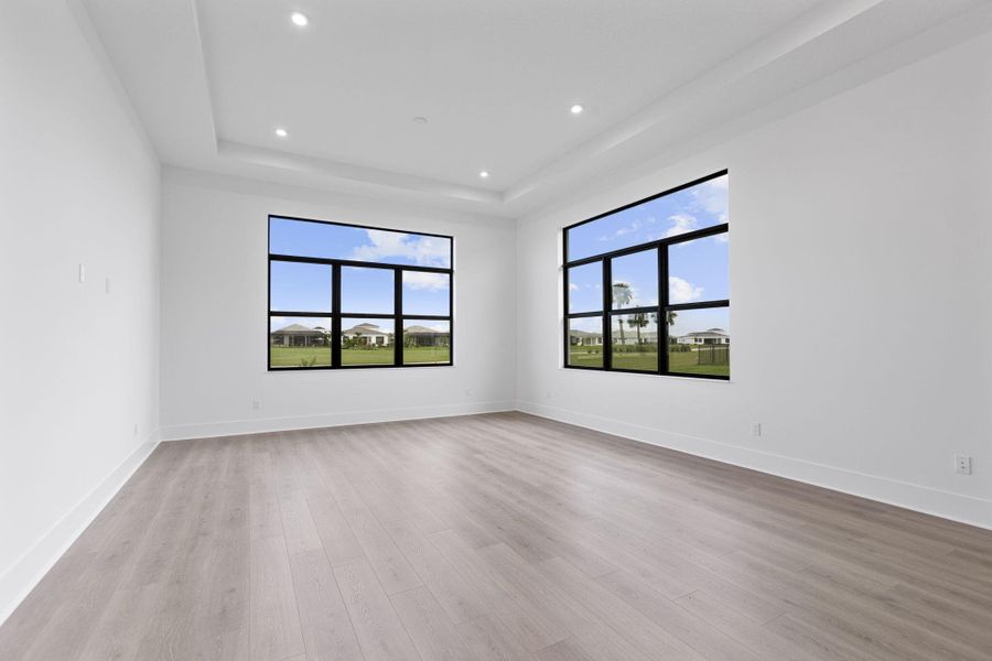 Spacious, unfurnished interior of a new home in Astor Creek Golf & Country Club, Port St. Lucie (Image 23).