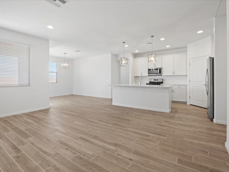 Spacious, unfurnished interior of a new home in Mandarina - Signature Series, Marana (Image 5).