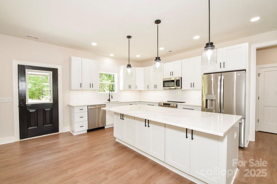 Furnished interior view inside a new home in , Marshville (Image 4).