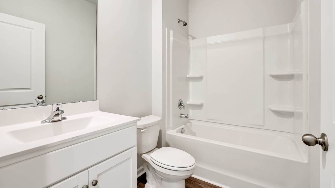 Furnished interior view inside a new home in Sidbury Station, Castle Hayne (Image 12).