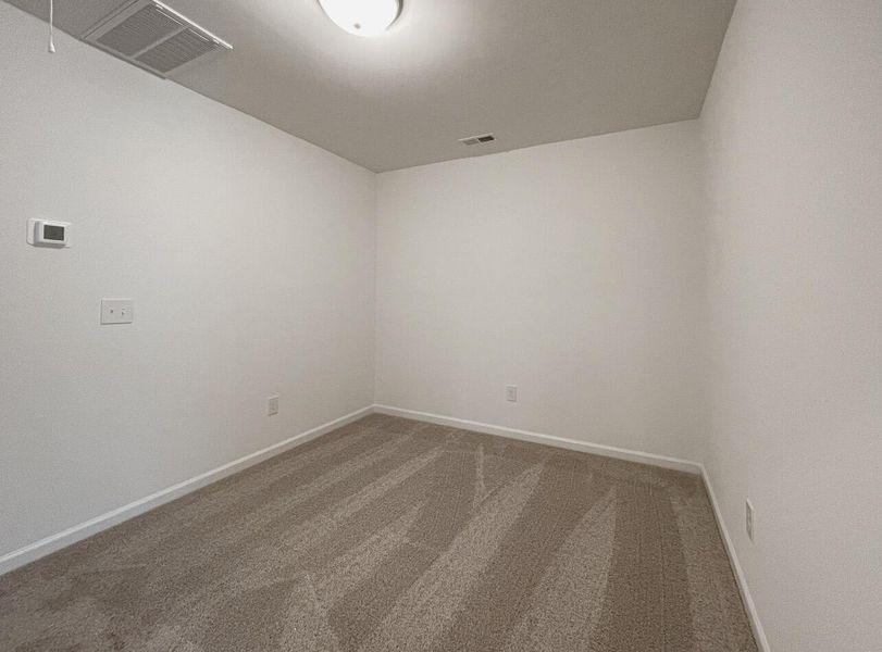 Spacious, unfurnished interior of a new home in East Main Townes, Spartanburg (Image 18).