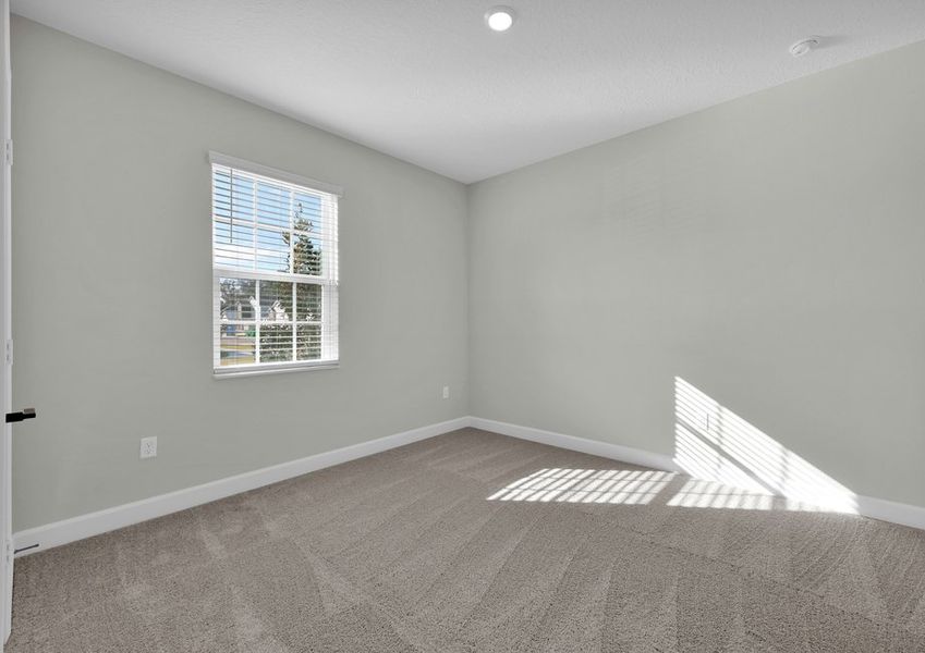 Each secondary bedroom includes bright windows, carpet and a closet Each secondary bedroom includes bright windows, carpet and a closet