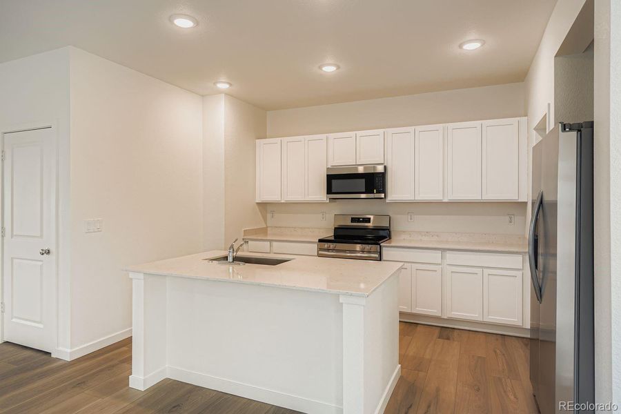 Furnished interior view inside a new home in , Thornton (Image 7).