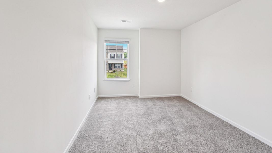 Representative unfurnished interior of a home built from the Craig by D.R. Horton in The Hideaway at Fox Meadows, Bluff City (Image 24).