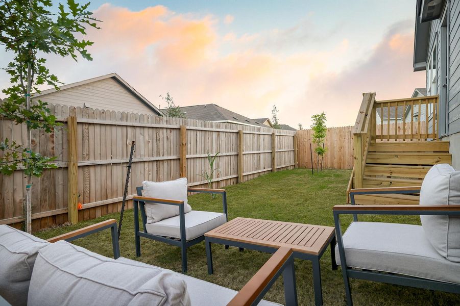Fenced backyard featuring outdoor lounge area Fenced backyard featuring outdoor lounge area