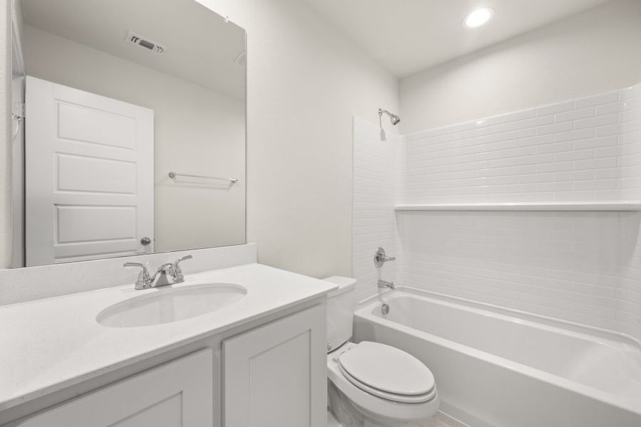 Front exterior of a new home in Myrtle Creek, Waxahachie, TX, highlighting curb appeal (Image 20). Front exterior of a new home in Myrtle Creek, Waxahachie, TX, highlighting curb appeal (Image 20).