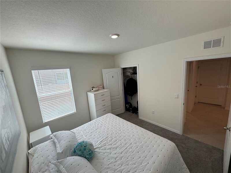 Furnished interior view inside a new home in Cypress Park Estates, Haines City (Image 13).