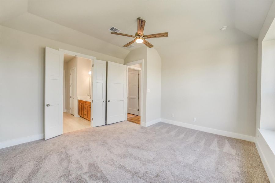 Spacious, unfurnished interior of a new home in Sunterra, Katy (Image 43).