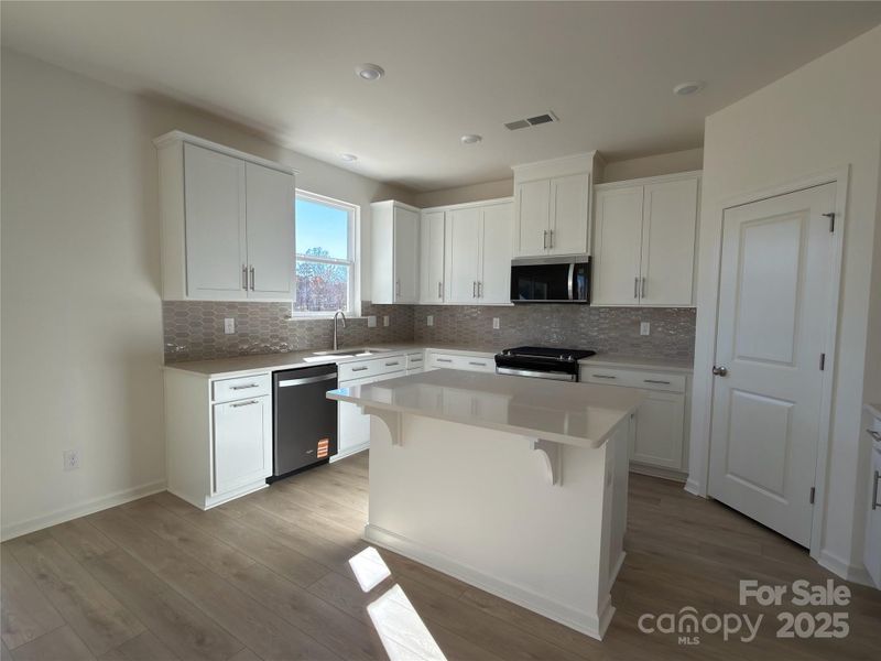 Furnished interior view inside a new home in Bella Vista Heritage, Denver (Image 7).