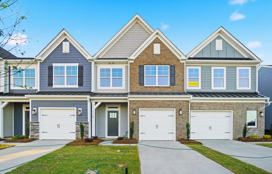 Front exterior of a new home in Blythe Mill Townhomes, Waxhaw, NC, highlighting curb appeal (Image 2). Front exterior of a new home in Blythe Mill Townhomes, Waxhaw, NC, highlighting curb appeal (Image 2).