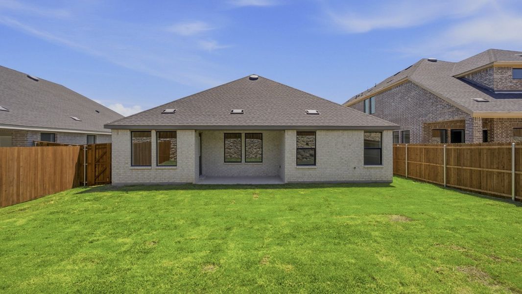 Exterior details and patio area of a home in Windchime, Celina (Image 3).