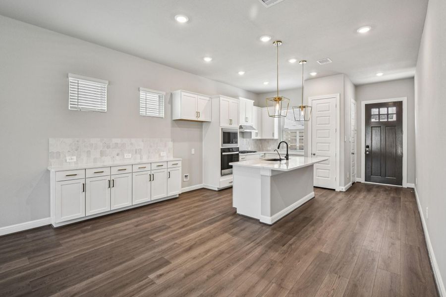 Furnished interior view inside a new home in Spring Brook Village - Luxe Series, Houston (Image 7).