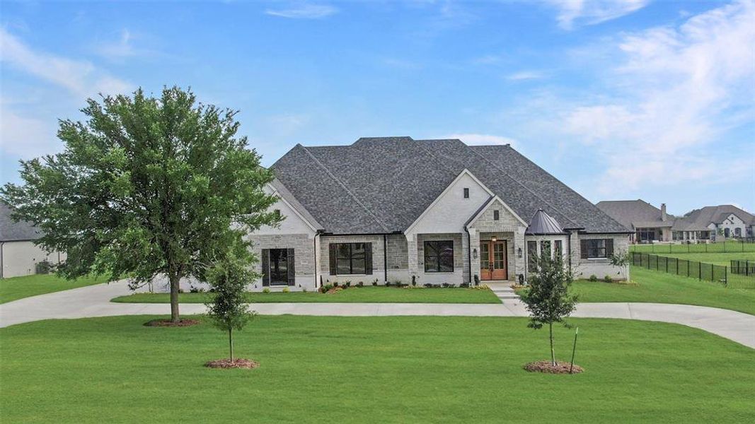 Front exterior of a new home in , Weston, TX, highlighting curb appeal (Image 24).