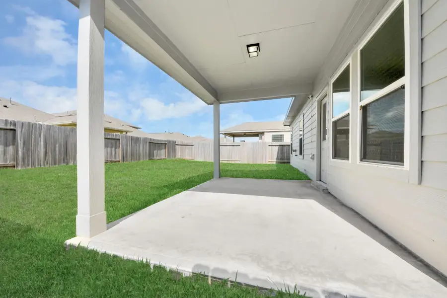 Exterior details and patio area of a home in Willow Trace, Spring (Image 30).