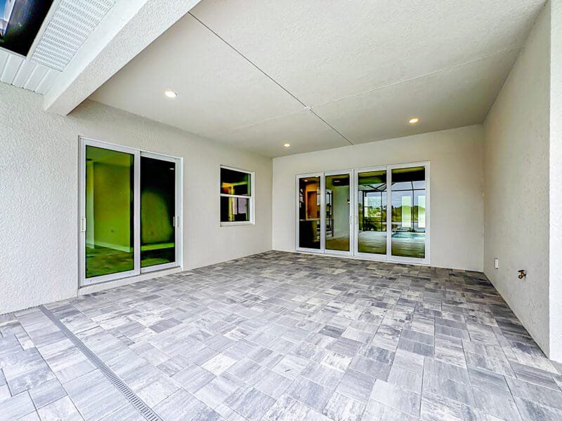 Exterior details and patio area of a home in River Preserve Estates, Parrish (Image 25).